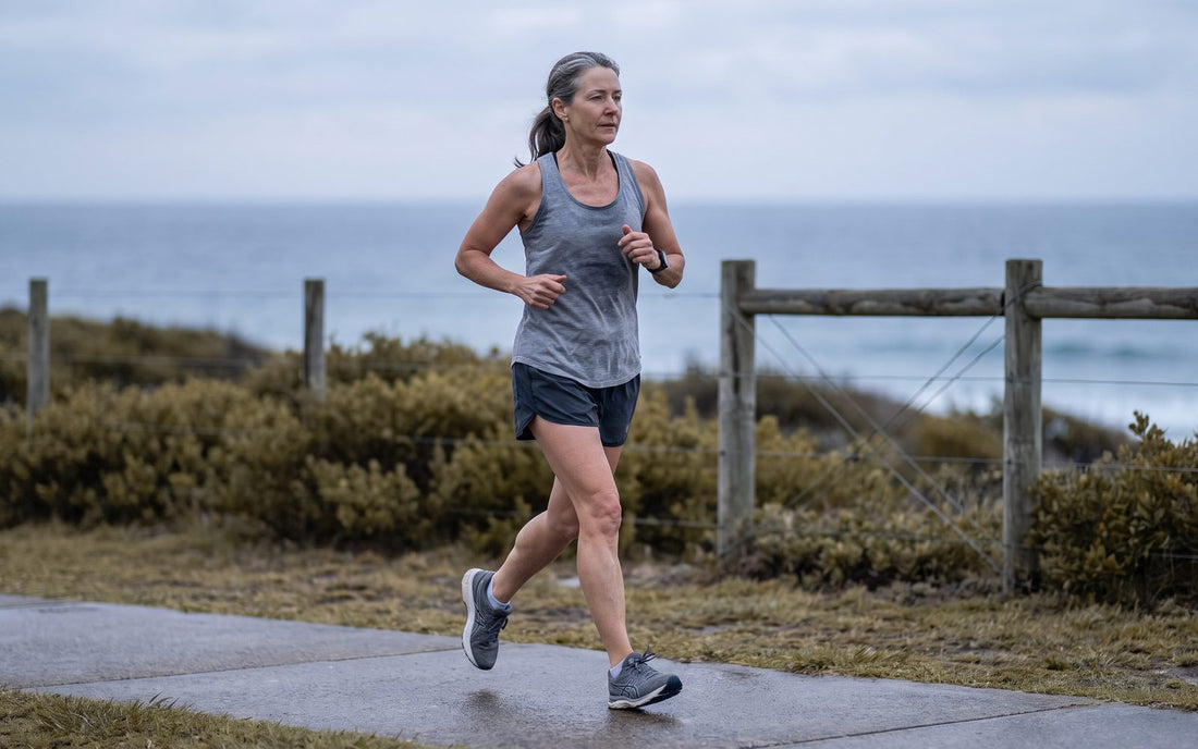 Woman in her fifties running on a coastal path on the New South Wales Central Coast